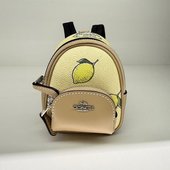 Coach  CAP03 Mini Court Backpack Bag Charm With Lemon Print - Picture 1 of 6